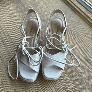Women’s size 7.5 Soda cream color wedges
